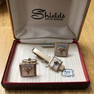 Vintage mother of pearl caduceus cuff link and tie bar sets
